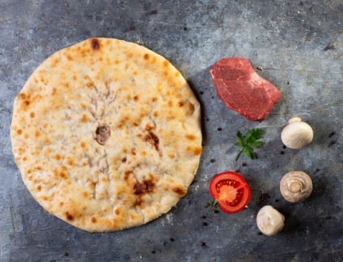 Осетинский пирог с мясом, грибами и помидорами Карлитто пицца  со скидкой